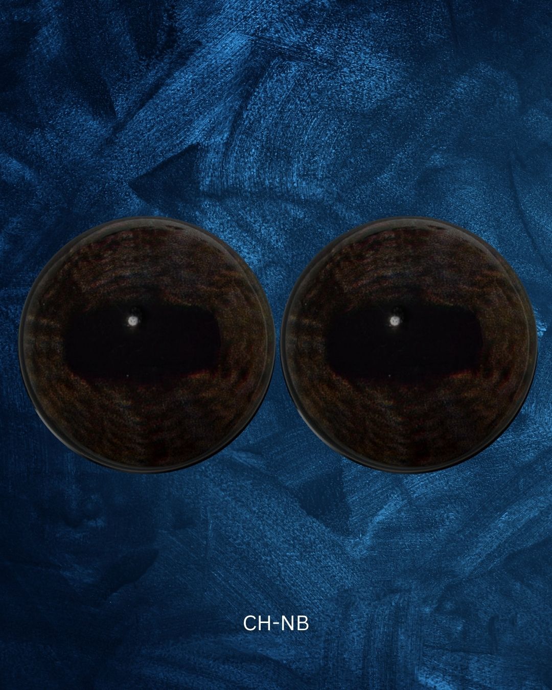 Tahr Eye - Oval Pupil with Dark Brown Iris with light brown mottling (CH)