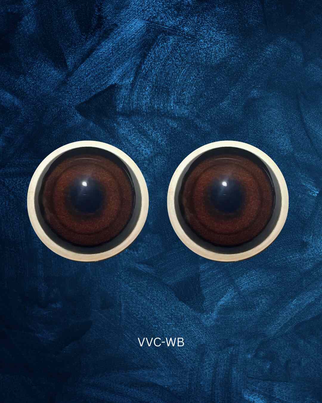Warthog Eye - Round pupil with medium brown Iris with black inner and outer rings (VVC)